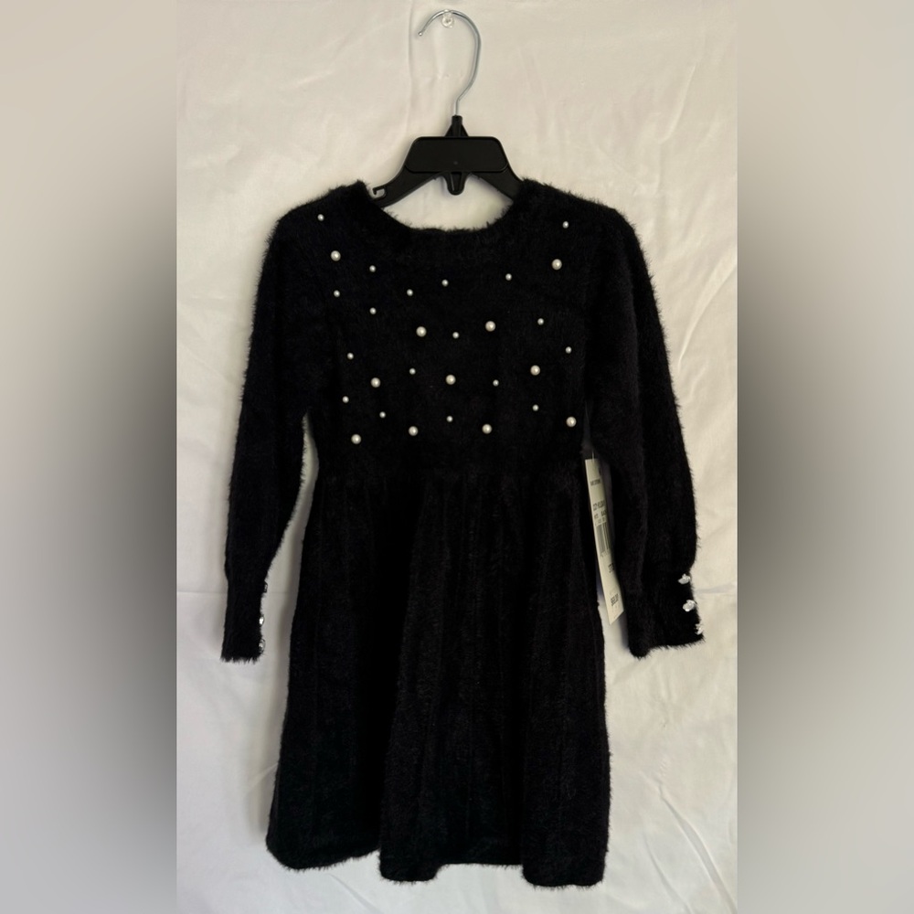 Rare Editions 
Black with pearls
